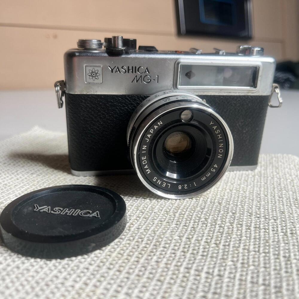 Yashica MG-1 35mm Rangefinder Film Camera 45mm f/2.8 Lens Made in Hong Kong Cap